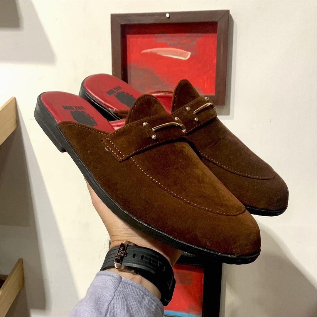 The Brown Buckle Mule .