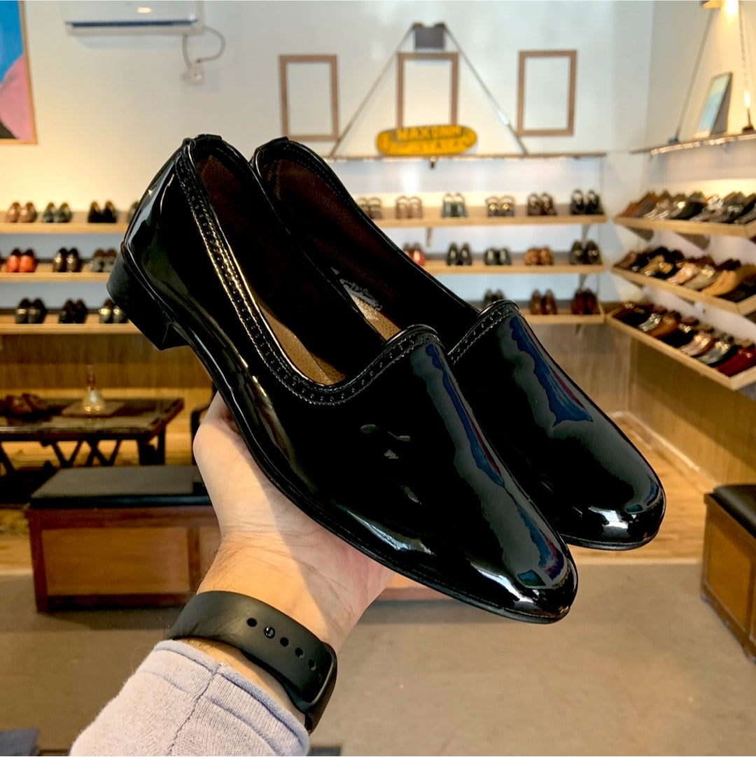 The Black Cut Slip-ons.